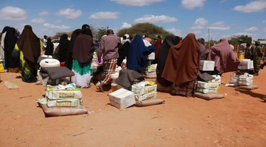 Gosha community receives food stuffs from the county government in collaboration with Kenya Red Cross society