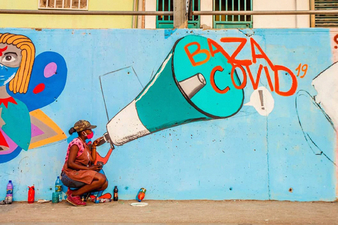 Oksanna Dias works on one of her pieces in central Luanda