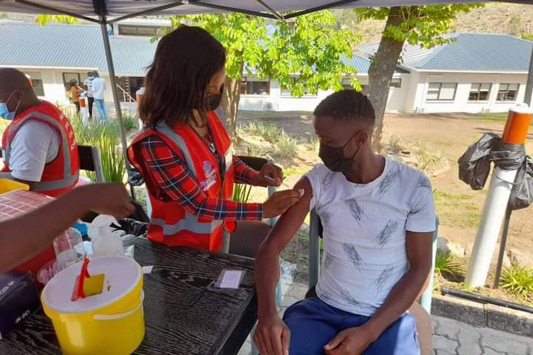 Manzini Wanderers striker Sandile Mhlanga getting a jab.