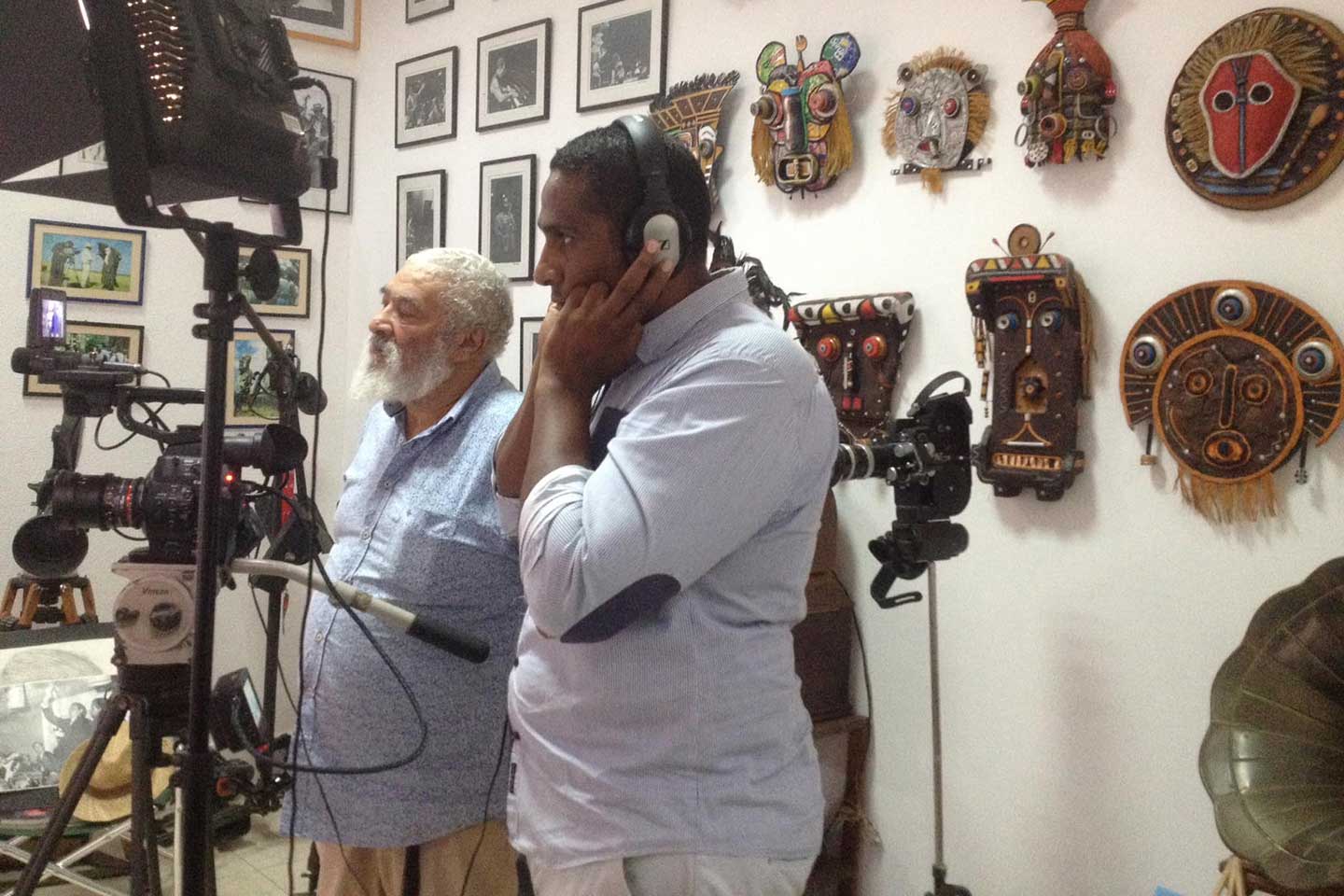 Óscar Gil next to his son in his studio – Credit: Gaspar Micolo