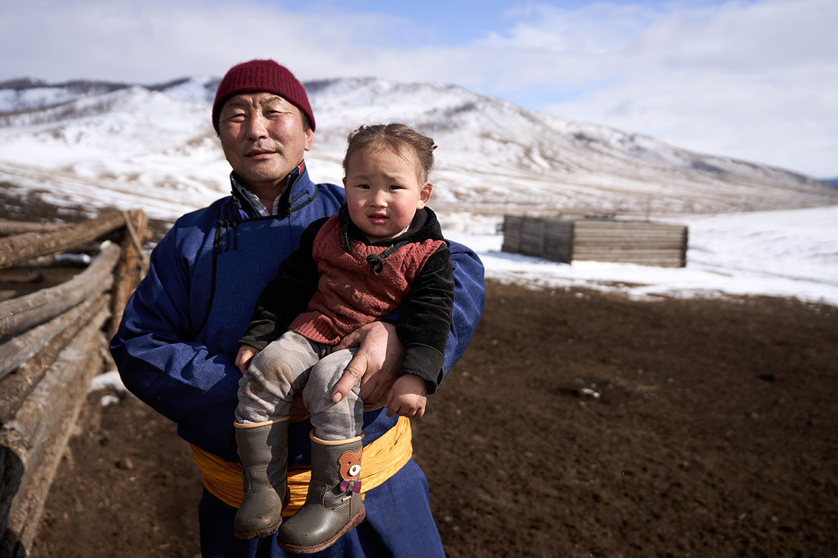 Buyanjargal and his granddaughter Anar at home. During Mongolia’s lockdown, some herder families have been separated from the children they send to school Ulaanbataar.