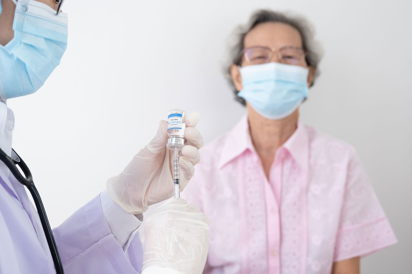 An elderly person getting vaccinated