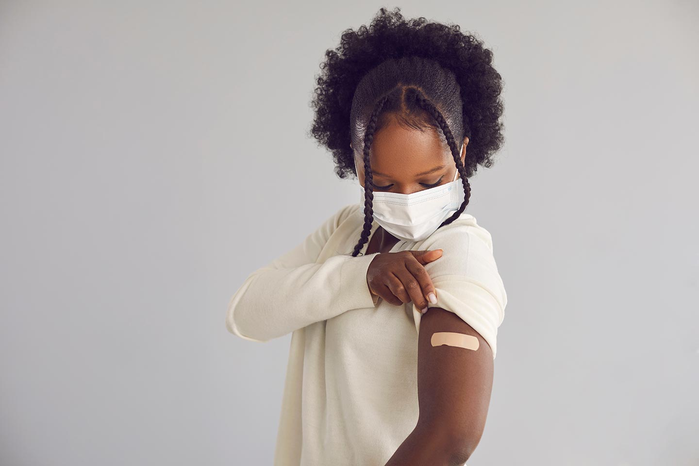 Woman receives COVID-19 vaccine injection