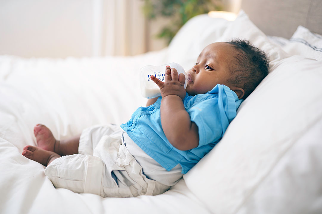 Baby drinking from bottle