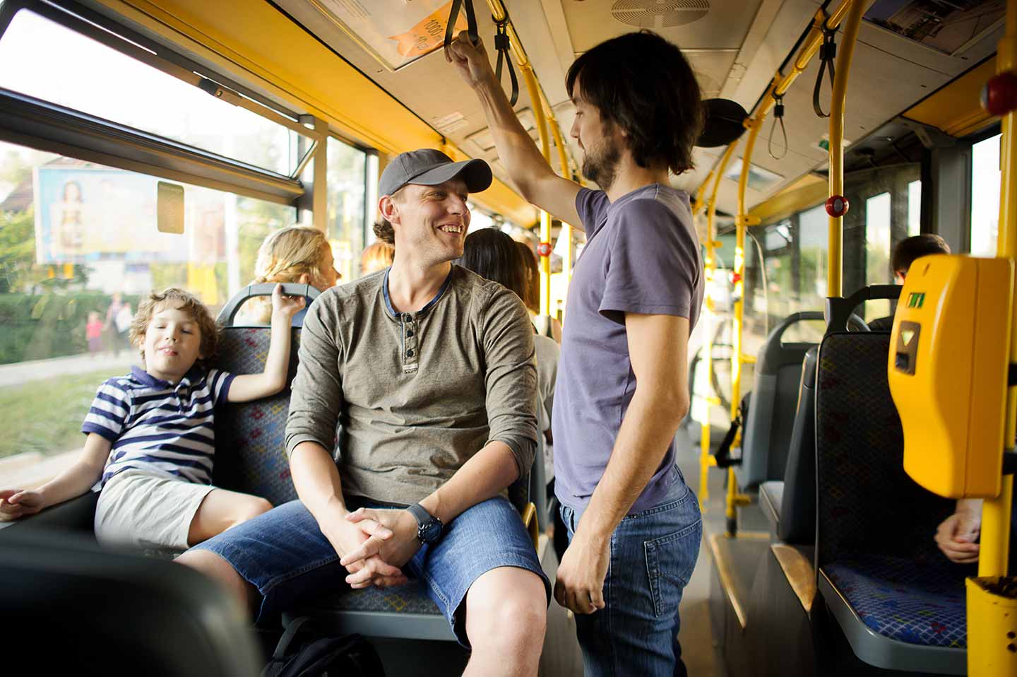 Passengers in the city bus, talking without masks