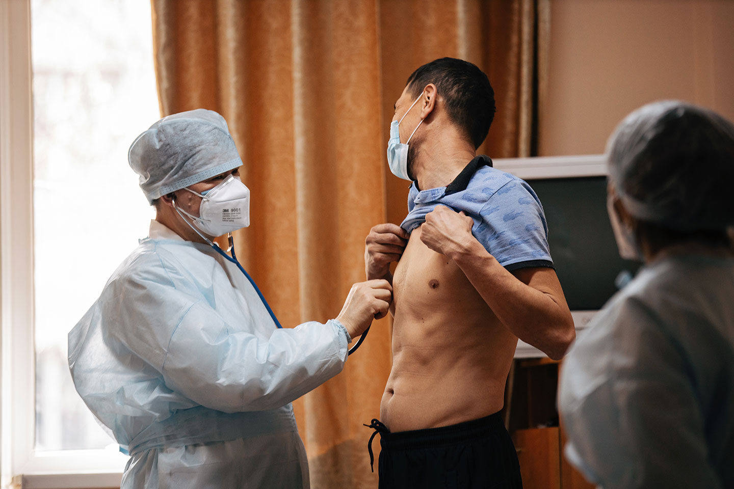 Dr. Adenov, Kazakhstan's director of the National TB Program, with a patient. Researchers are pushing to capitalise on the success of mRNA technology against COVID-19 and are aiming to develop an mRNA vaccine to be used against TB. Copyright: USAID Central Asia, (CC BY-ND 2.0)