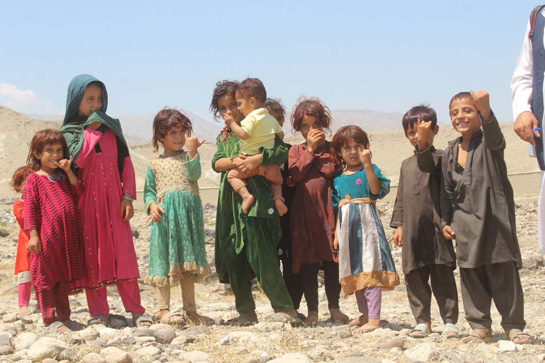 Children show their inked fingers – a sign they have been vaccinated against polio. © WHO/Afghanistan