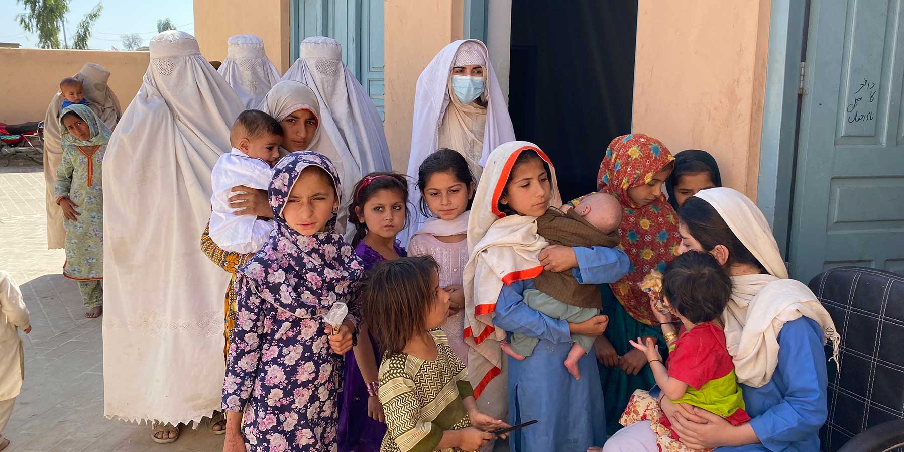 Families take their babies to be immunised in northwestern Pakistan. Credit: Huma Khawar