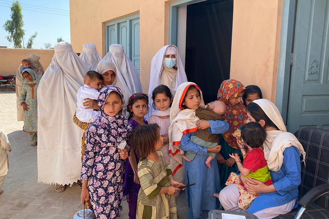 Mothers bring their children for vaccination but it's mostly the older girls/ siblings holding the babies. Credit: Huma Khawar