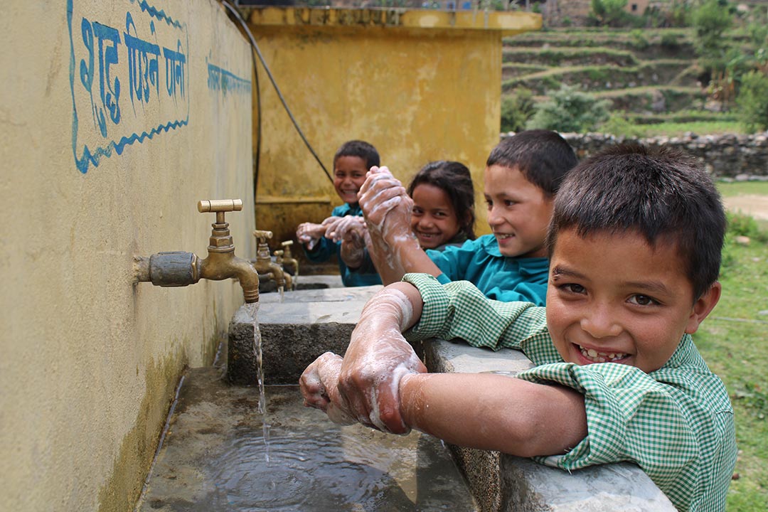 Children washing their hands. Credit: Chhatra Karki