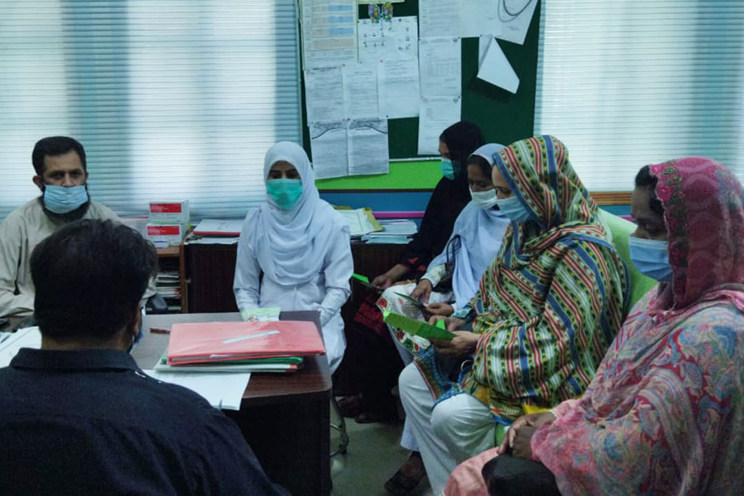 Doctor, staff and patients at THQ Gujjar Khan's TB Unit