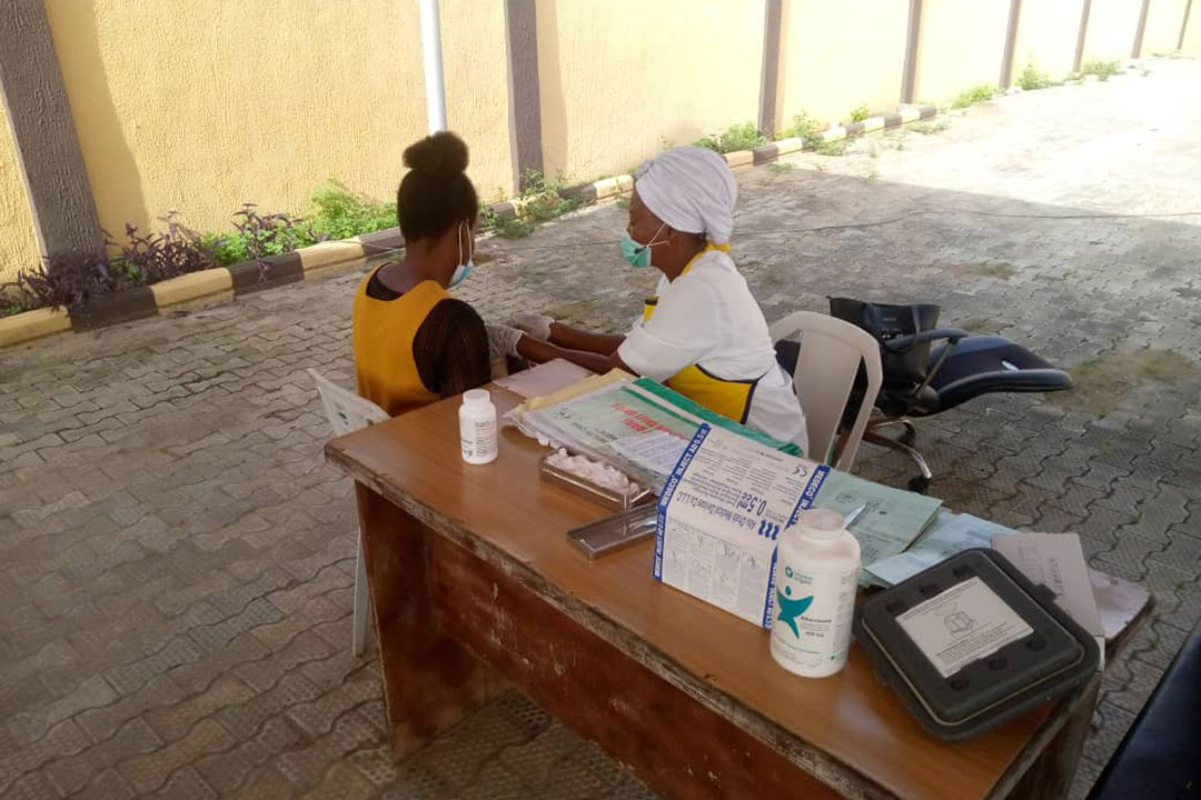 Anna Chijioke getting her baby vaccinated. Credit: Royal Ibeh