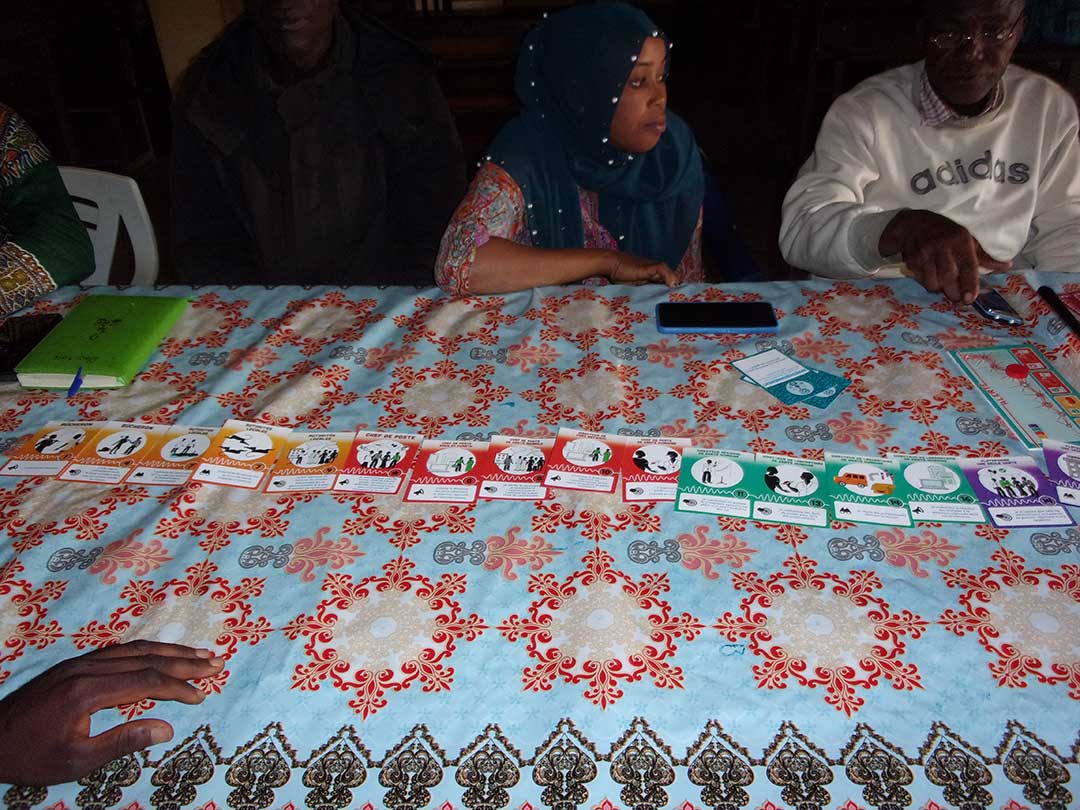 An educational board game 'Alerte' helps teach local communities, vets and wildlife rangers how to spot a potential animal disease outbreak. Credit: World Organisation for Animal Health