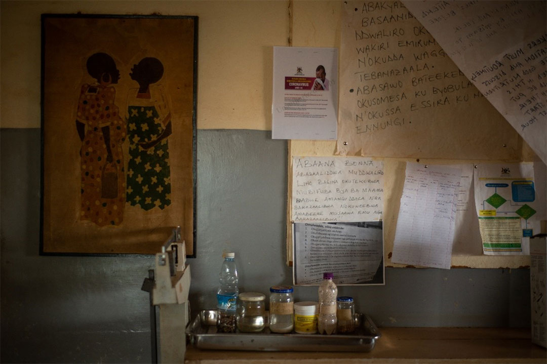 A poster on the wall of the maternity clinic in Mpigi Health Centre IV in Mpigi Town, Uganda, warns of the dangers of COVID-19. Photo: PATH/Will Boase.