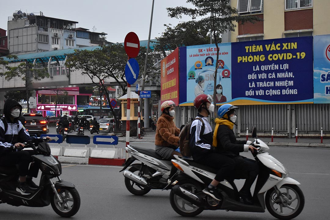 A billboard in Hanoi, Vietnam says: “Getting vaccinated against COVID-19 is an individual’s right and the responsibility towards the community.”