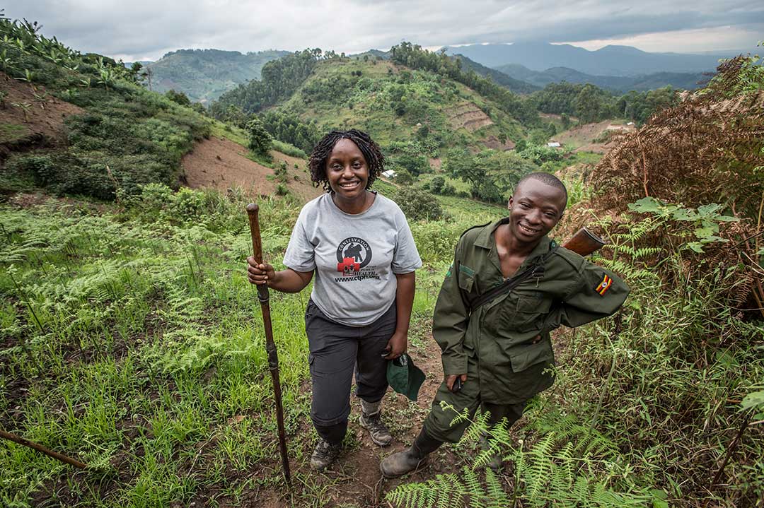 Dr Gladys Kalema-Zikusoka with a ranger during gorilla tracking activity in Bwindi Impenetrable National Park. Photo by Jo-Anne McArthur