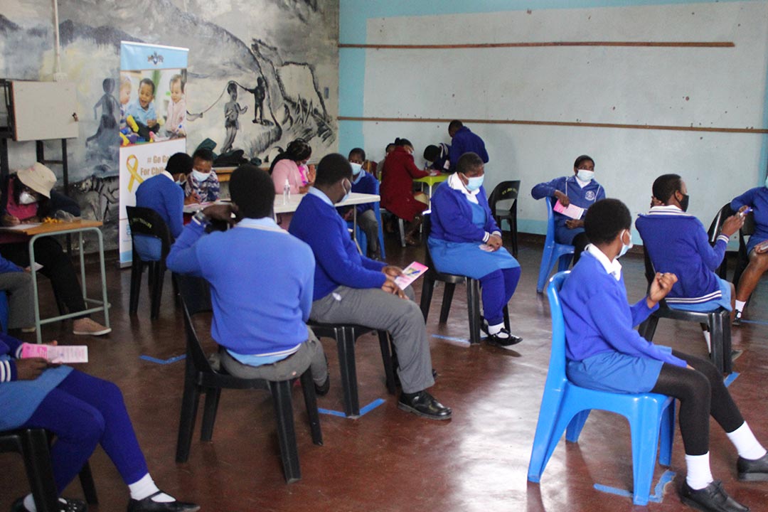 Pupils from an Eswatini school being sensitised about the HPV vaccine by cancer unit staff. Credit: Nonduduzo Kunene