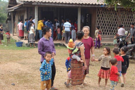 Parents in Savannakhet Province turn out with their kids in large numbers for measles vaccination. Credit Napua Nzyuko