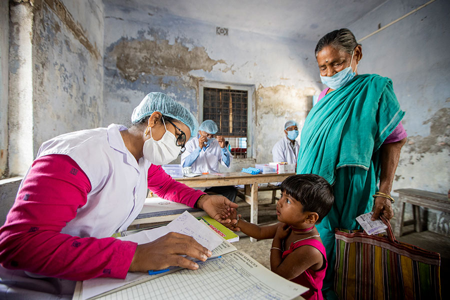 Boat-borne health care workers like Apu Mandol also deliver routine vaccinations to the kids of the Sundarbans – preventive medicine can have an outsize impact in zones where health care infrastructure is thin. Gavi/2022/Benedikt v.Loebell