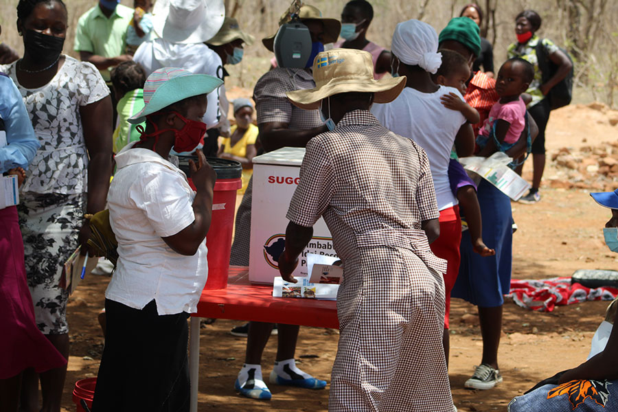 Memory Muchuwa delivering routine immunisation services in Buhera District, rural Zimbabwe. Credit: Elia Ntali