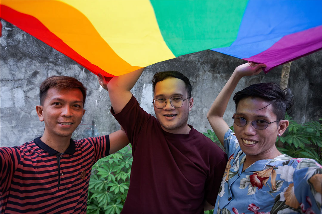 Justin with Miles (left) a colleague from Youth Voices Count and Vize (right), one of the co-founders of the Iloilo Pride Team.