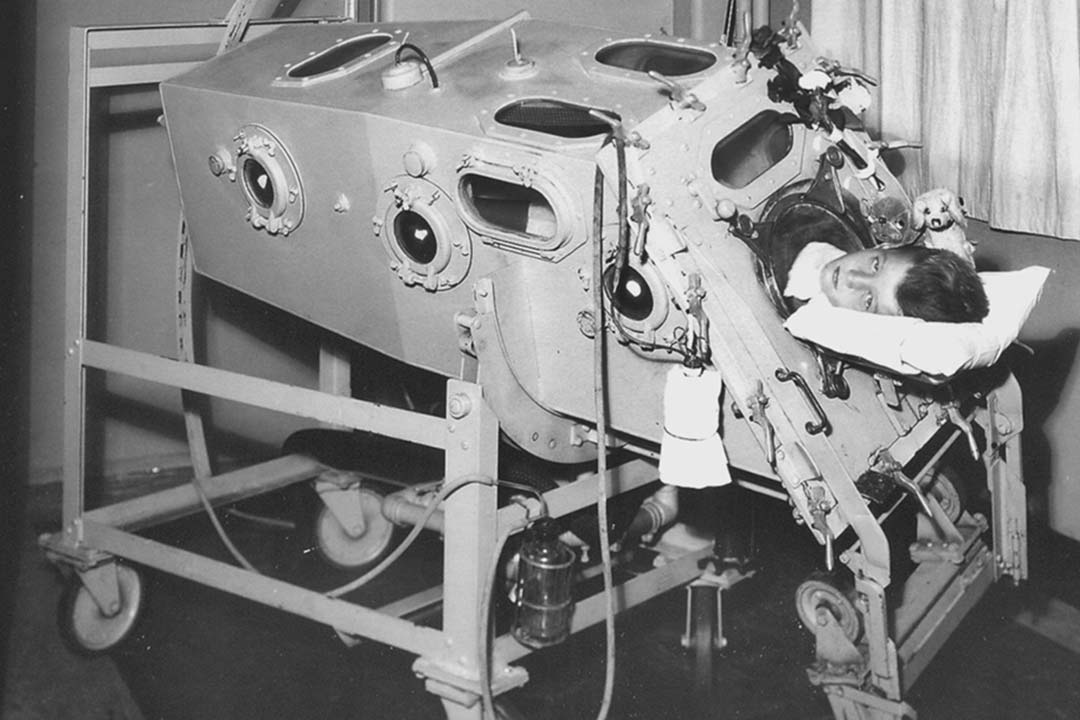 A child is treated in an early version of the iron lung at Children’s Hospital Boston in 1932. Credit Courtesy of March of Dimes