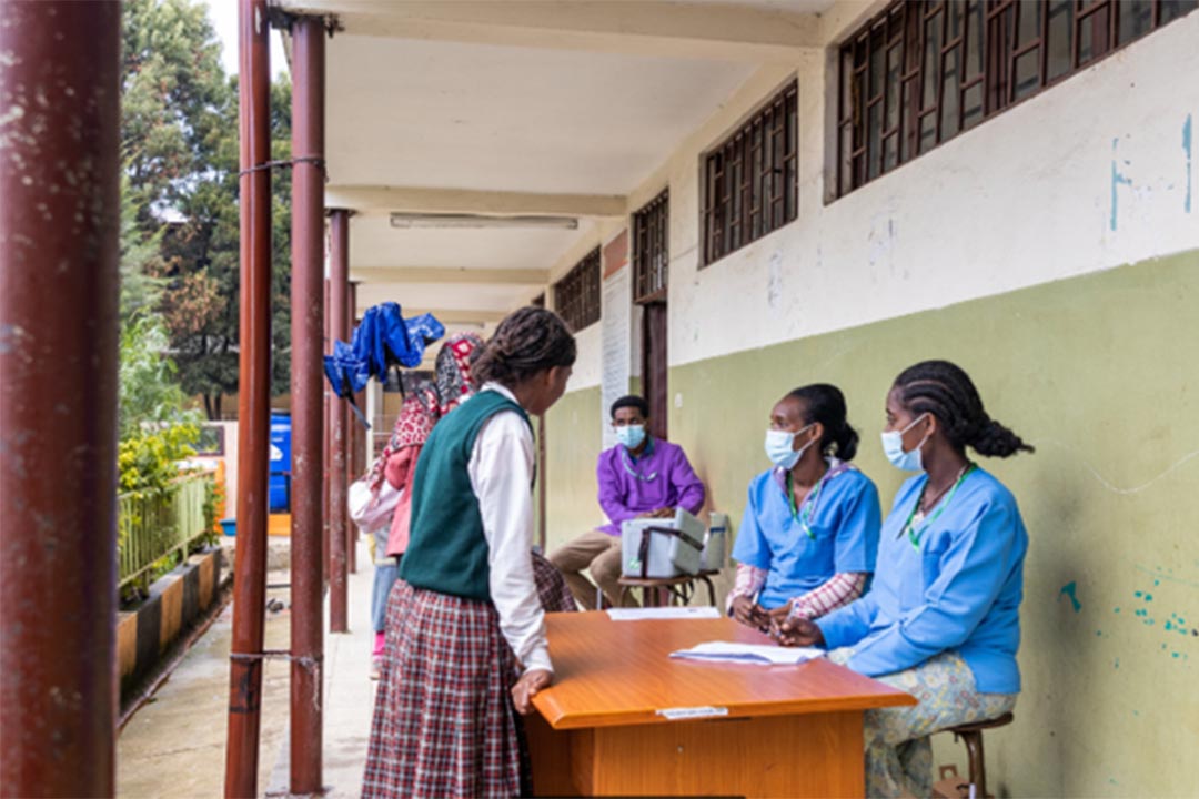 Tsegayenesh Tefera (right) and Zera Jaleta register students for the HPV vaccination at Felege Meles Primary School in Addis Ababa, Ethiopia. Photo: ©Gates Archive/Genaye Eshetu.
