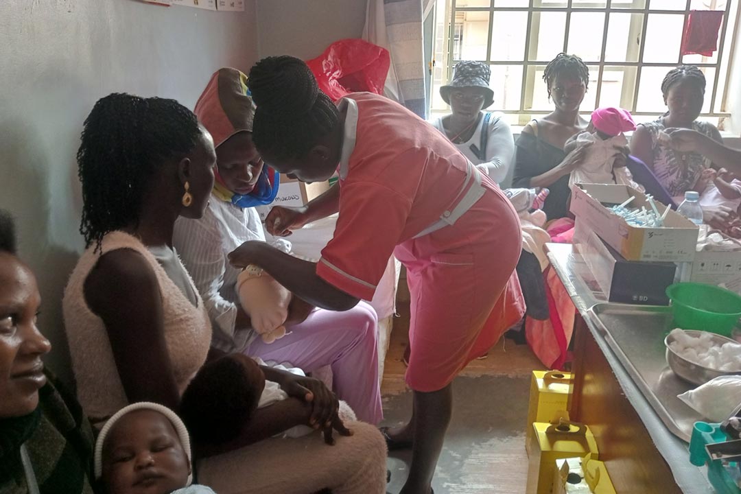 A nurse at Mukono General Hospital vaccinating a child. Credit: Dicta Asiimwe