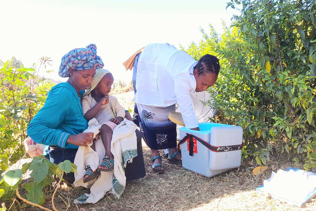 A health worker prepares to administer vaccine last month in Ambassel District. Credit: Solomon Yimer