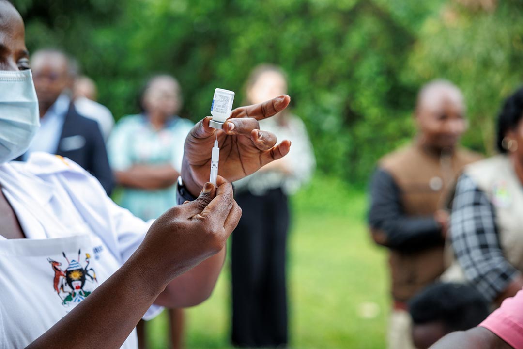 A health worker preparing a syringe with vaccine. Credit: Gavi/2022/Jjjumba Martin