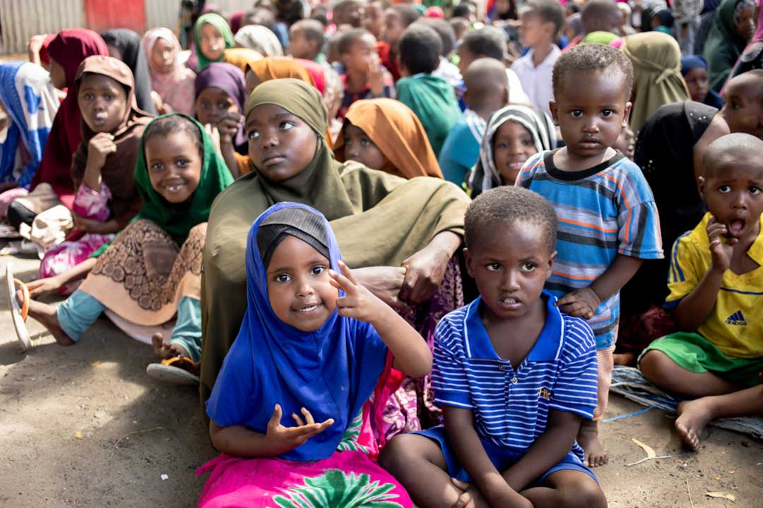 Children wait to be vaccinated during house-to-house visits for a national polio vaccination campaign in Mogadishu, Somalia, on Tuesday 06 June 2022. Credit: ©WHO/ Ismail Taxta