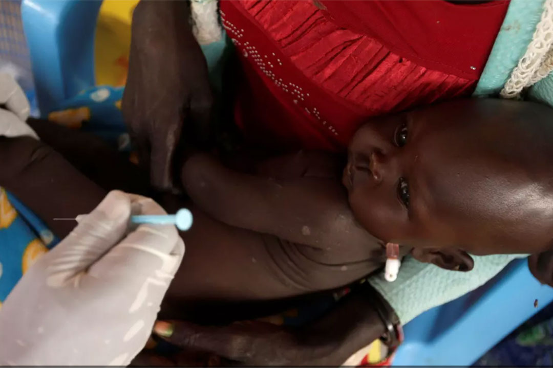 The COVID-19 pandemic vaccination response offers hope, but we mustn't be complacent. Credit: Reuters/Tiksa Negeri
