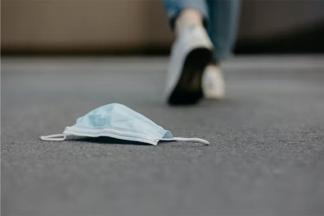 A facemask on the ground. Credit: Antonie S/Shutterstock