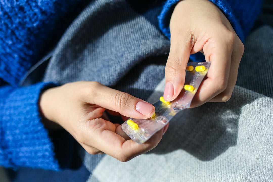 Person holding blister pack. Credit: Polina Tankilevitch on PExels