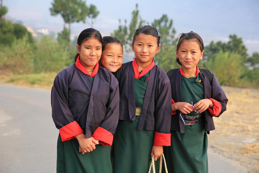 Young girls on their way to school in rural Bhutan.