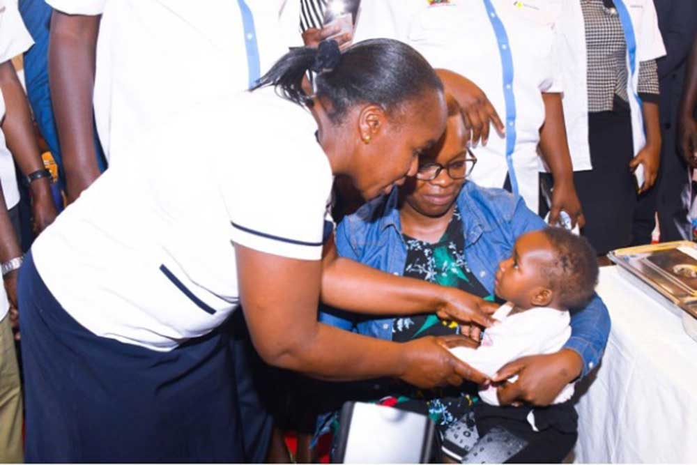 A nurse administers RTS, S vaccine to a child in Mbale, Vihiga County on March 7th 2023.  Credit: Isaac, Nation Media Group (NMG).