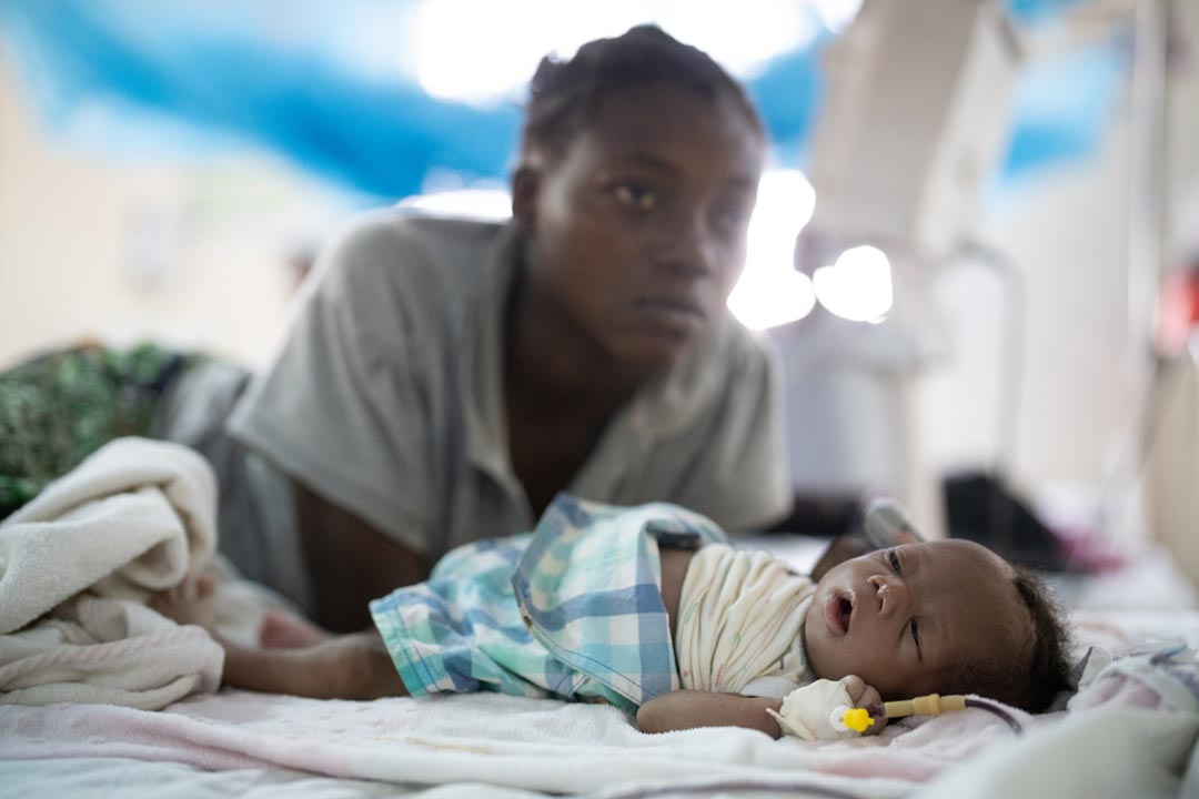 In Kakuma, Turkana County, Kenya, families come to the Ammusait General Hospital malnutrition ward to tend to their sick children and family members. Staff is limited so family members become caretakers at the hospital. Credit: Larry C. Price