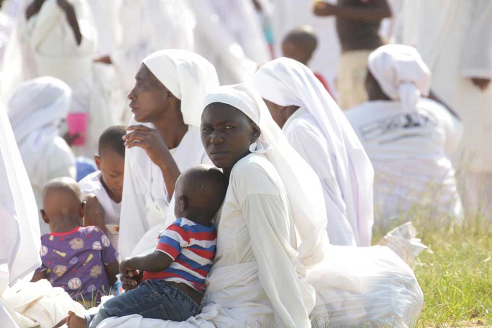 Members of apostolic religious groups in Zimbabwe are frequently opposed to childhood vaccination. Credit: Elia Ntali