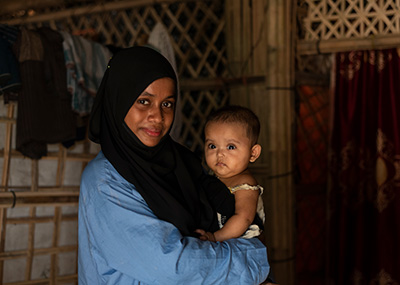 A mother and small child photographed during a vaccine campaign in Bangladesh. Credit: Ashraful Arefin