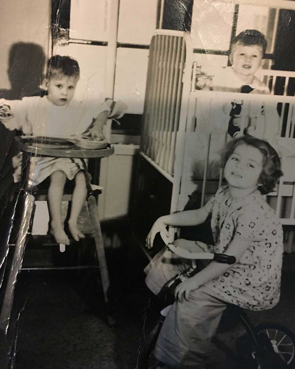 Marny Eulberg (bottom right) sits on a tricycle during her hospital stay for polio infection in 1950. She recovered, became a physician, and ran one of the first dedicated PPS clinics in the U.S. Credit: Marny Eulberg