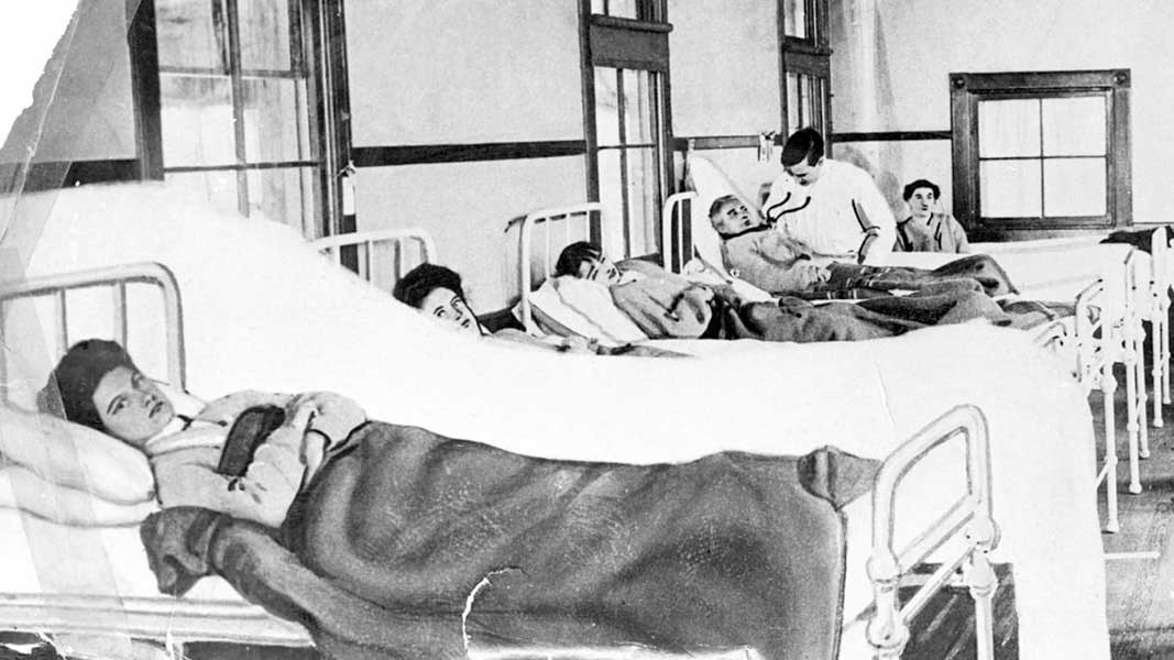 Mary Mallon was a cook in the early 1900s and an asymptomatic carrier of Salmonella Typhi, the bacterium that causes typhoid fever. Pictured here in a hospital ward, she lived decades in quarantine after she refused to give up working as a cook. Credit: Wikimedia commons