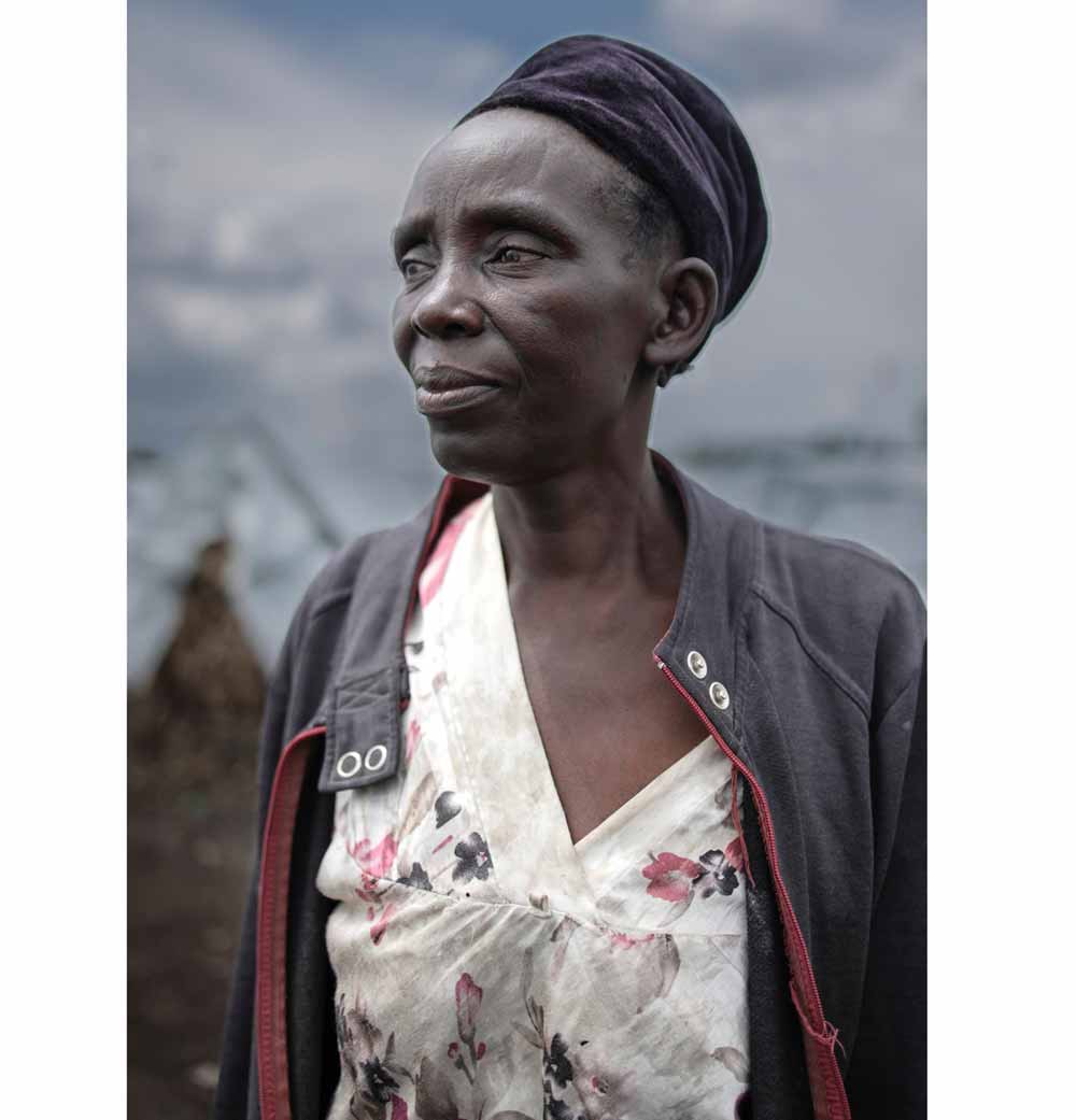 Maisha, 57, in front of her shelter in Bulengo camp, about 15 kilometers from Goma in the east of the Democratic Republic of the Congo.  Photo: © WHO / Guerchom Ndebo