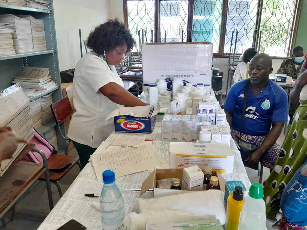 Health workers packing medicines. Credit: Charles Mangwiro
