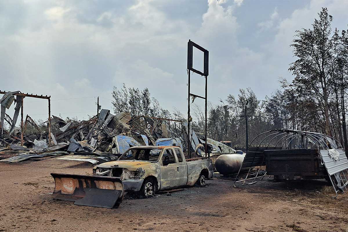 Enterprise, Northwest Territories, Canada in the aftermath of the devastating 2023. The wildfires destroyed nearly all buildings in this small town of 150 people. Image by Jeffery J. Nichols via Wikimedia Commons (CC BY-SA 4.0).
