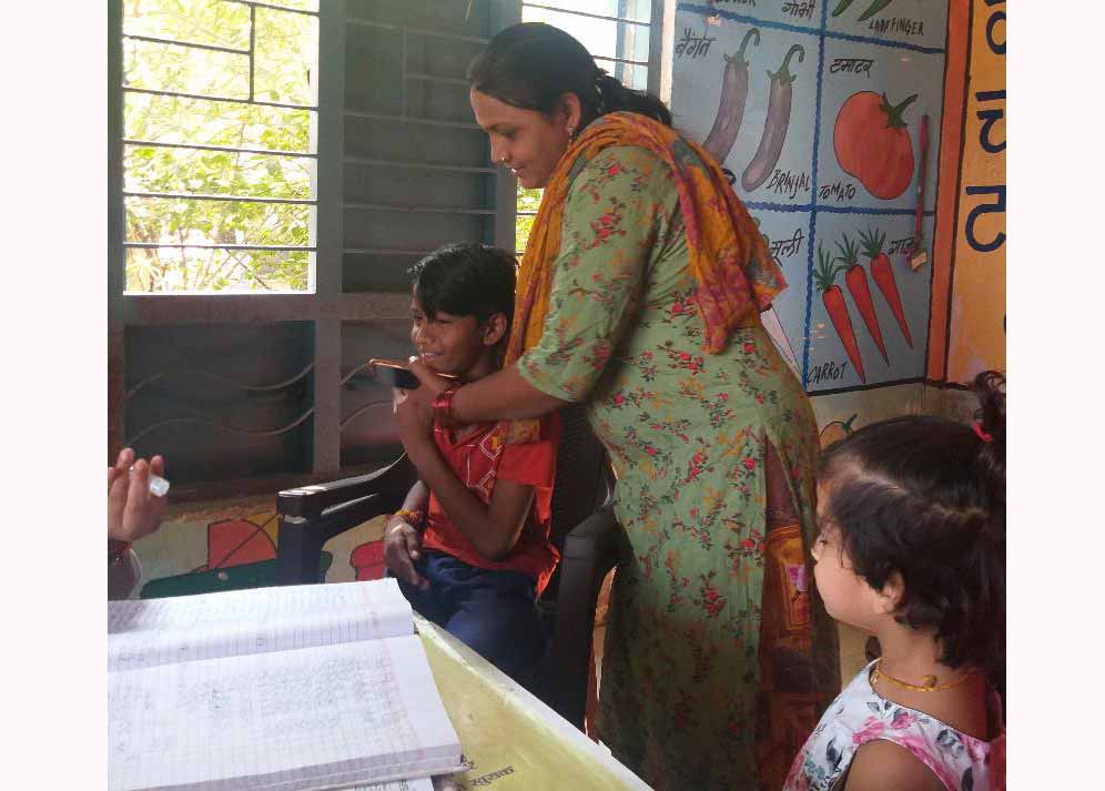 Vaccination at the centre where Manju Shrivastava works.