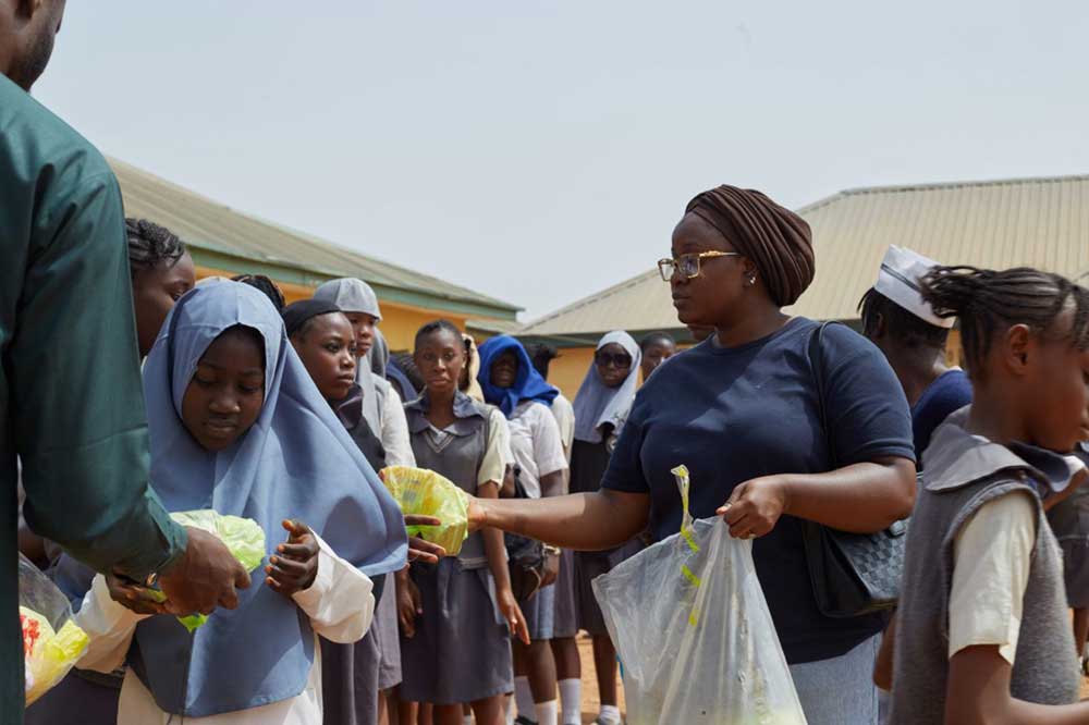 Hajara distributes pads to school girls in Abuja. Credit: Hajara Husseini