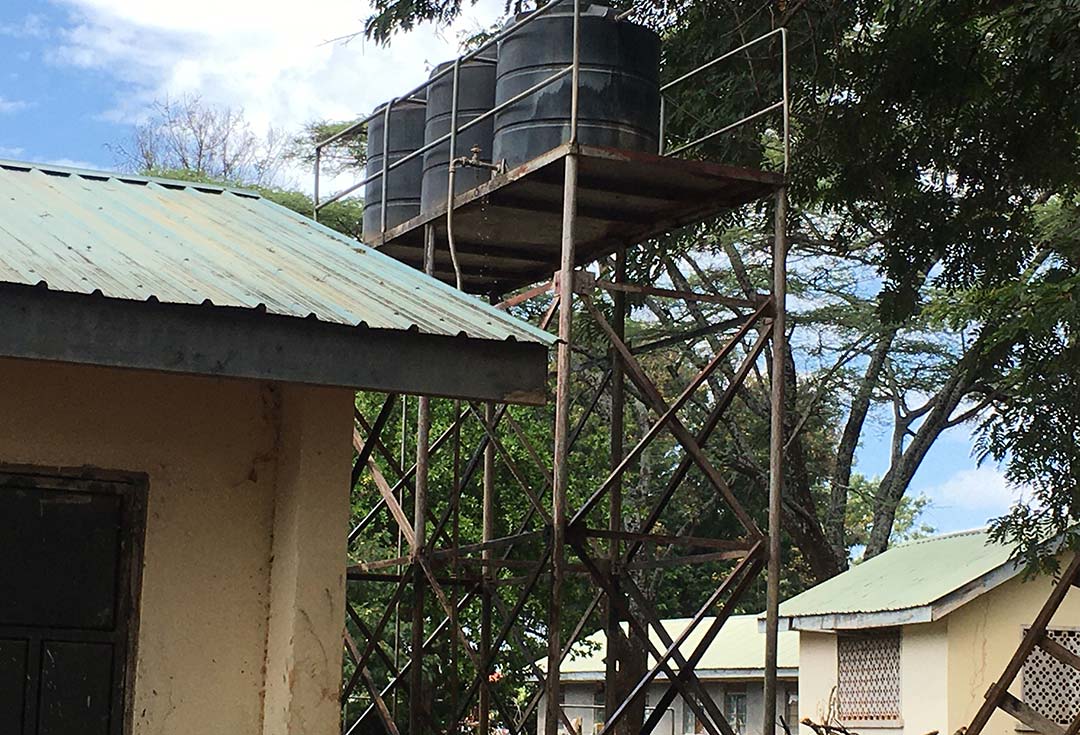 Water storage in learning institutions means students don't have to worry if there is not enough sun to power the solar panels. Credit: Pius Sawa
