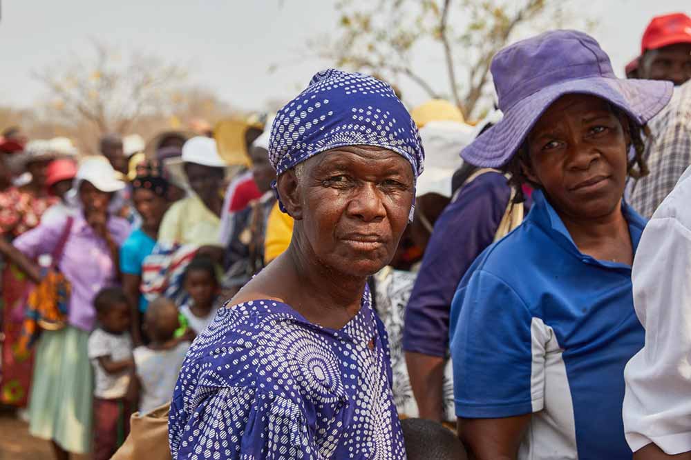 Two elderly women join other recipients, during the recent elephantiasis MDA in 7 districts of Zimbabwe, targeting 1.4 million people. Credit: Higherlife Foundation