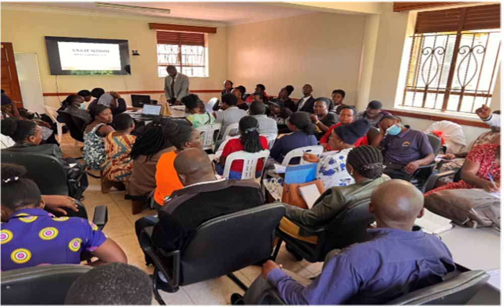 ZDC consultant Kakeeto supporting health workers in catchment area mapping and planning for immunisation services in Wakiso district 