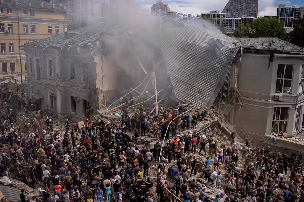 Emergency workers clean the area at the site of Okhmatdyt children’s hospital in Kyiv, Ukraine, hit by Russian missiles in July 2024. Alex Babenko/AP Photo